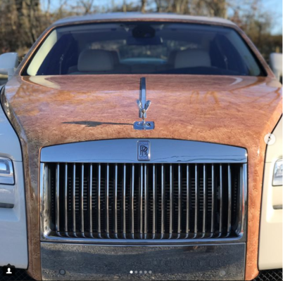 A Brown Bentley Car With Metallic Features