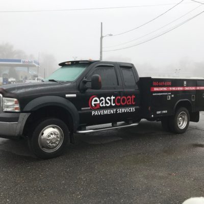 A Pest Coat Printed Truck in Black Color