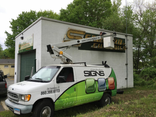 A Signboard Installation in Progress for a Facility