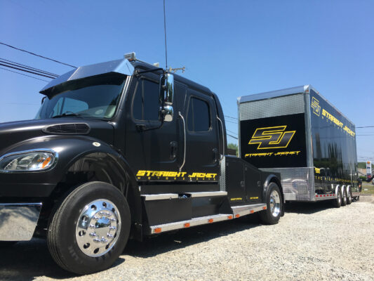 A Straight Jacket Truck With Branding Side