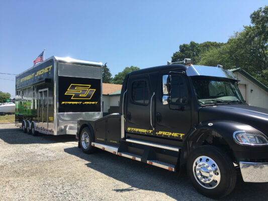 A Straight Jacket Truck With Branding