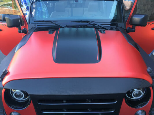 A Car Front in Red and Black in Matt