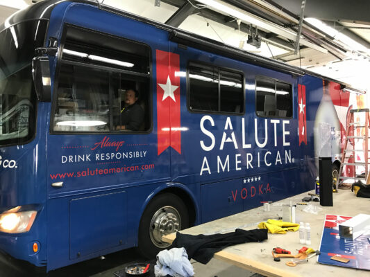 The Side of Salute American Bus in Blue Color