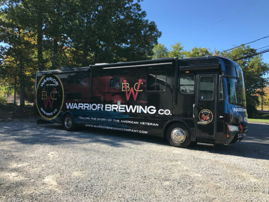 Warrior Brewing Company Printed on a Bus Front