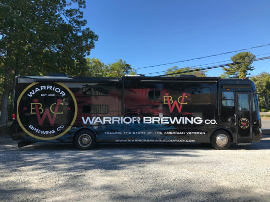 Warrior Brewing Company Printed on a Bus