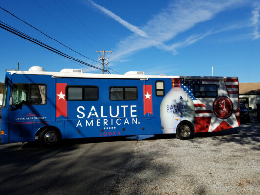 Salute American Printed on a Bus Side View