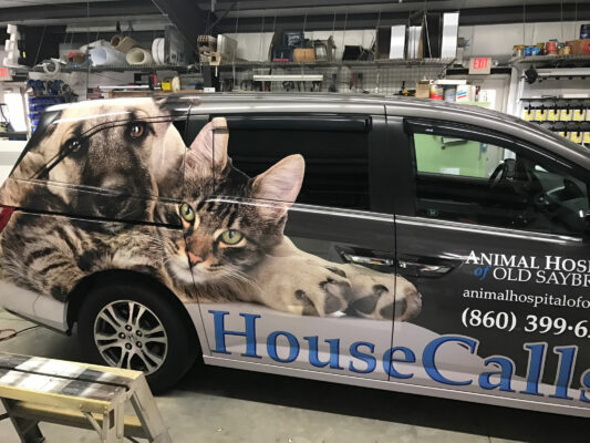 A House Calls Black Color Car With Printing