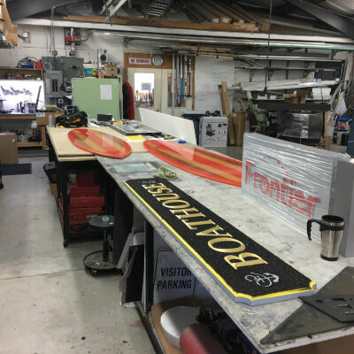 A Sign Making Workshop With Signs in Progress