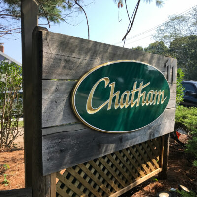 Chatham Board in Wood on a Green Background