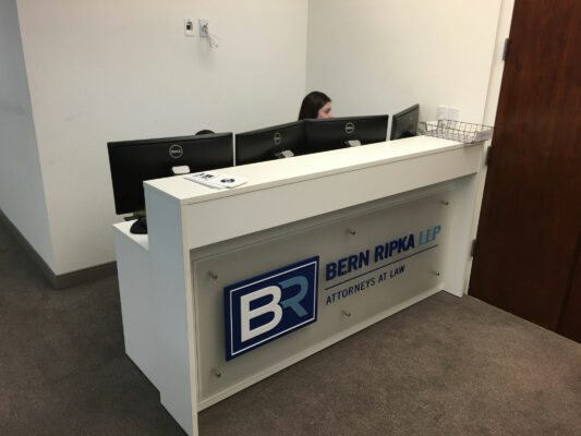 A Reception Corner With Bern Ripka Sign