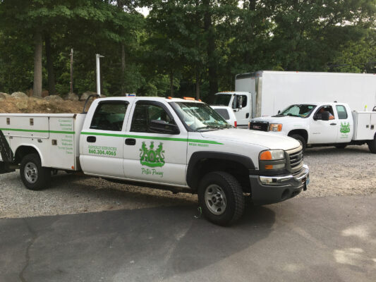 A Fleet Vehicle With an Asphalt Services Company Logo