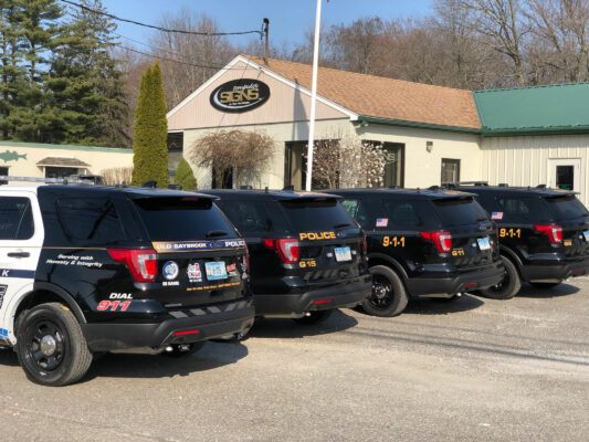 The Back of a Line of Police Vehicles