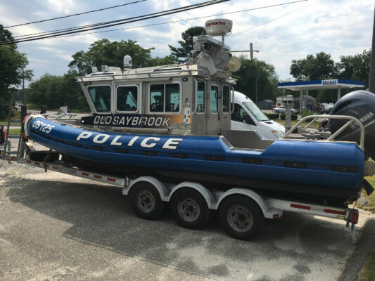 A Police Vehicle Boat With Printing