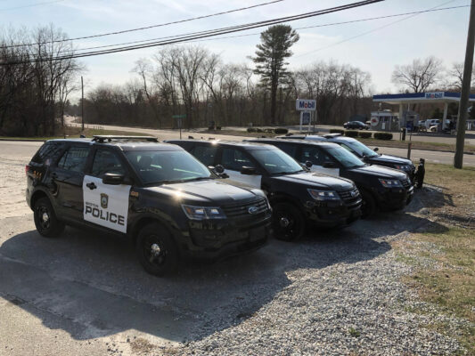 The Front of Police Vehicles Placed in a Line