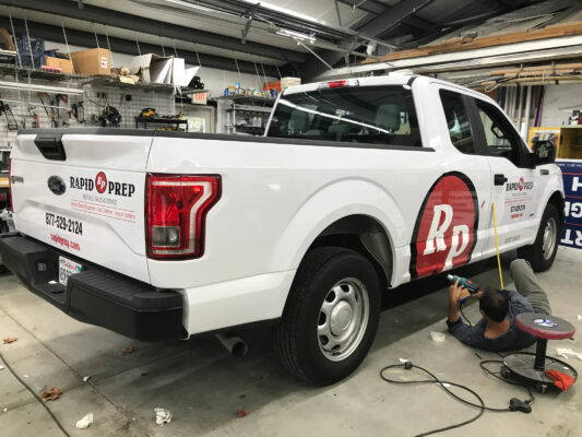 A Rapid Prep Logo on the Back of a Truck