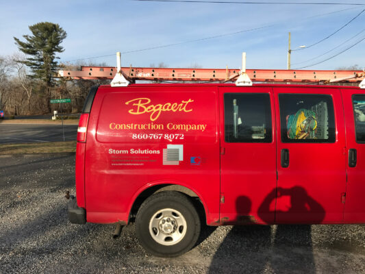 The Side of a Bogaert Truck in Red Color