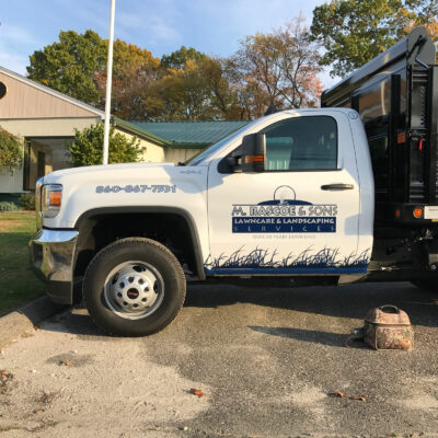 The Driver Side of a Truck With Rascoe and Sons Logo