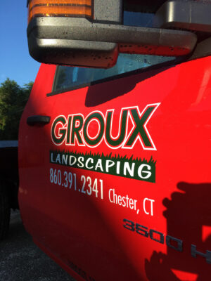 Giroux Landscaping Logo on a Red Color Door