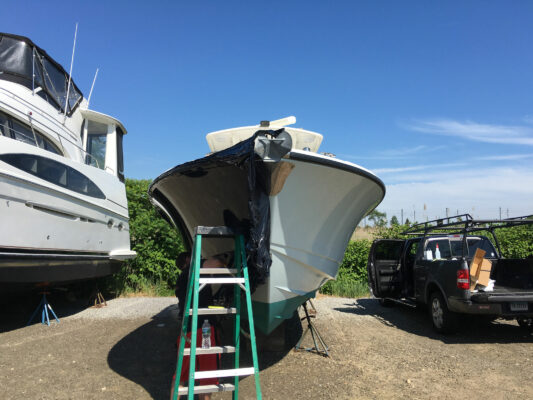 The Front of a Boat With a Ladder