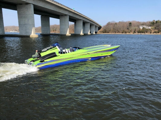 A Boat in Yellow and Blue on Water