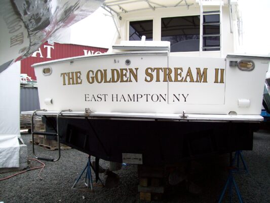 The Golden Stream Two Printed on a Golden Sign