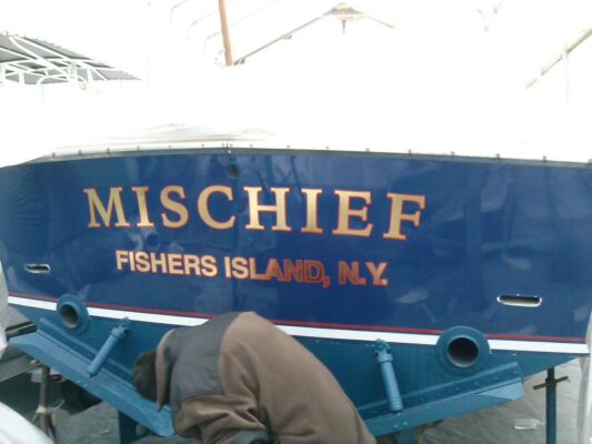 Mischief Fishers Island Printing on a Boat