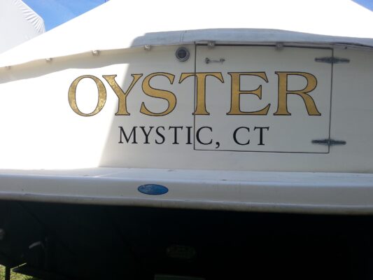 Oyster Mystic Logo Printed on a Boat