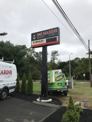 A Sign Post Placed in a Parking Lot